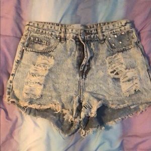 Distressed and studded shorts